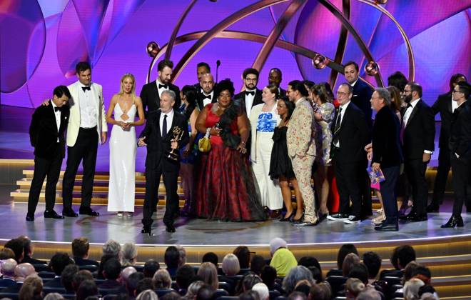 Jon Stewart (C), cast, and crew accept the Outstanding Talk Series award for The Daily Show onstage during the 76th annual Primetime Emmy Awards at the Peacock Theater in Los Angeles on Sunday, September 15, 2024.  LAP2024091573 JIMxRUYMEN
