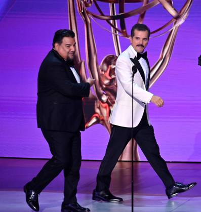 (L-R) Cris Abrego, Television Academy Chair, and John Leguizamo appear onstage during the 76th annual Primetime Emmy Awards at the Peacock Theater in Los Angeles on Sunday, September 15, 2024.  LAP20240915112 JIMxRUYMEN
