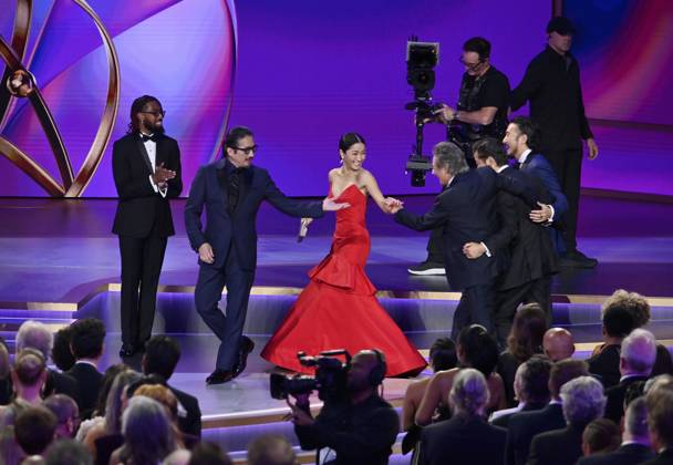 Hiroyuki Sanada and Anna Sawai walk onstage to accept the Outstanding Drama Series award for Sh?gun during the 76th annual Primetime Emmy Awards at the Peacock Theater in Los Angeles on Sunday, September 15, 2024.  LAP2024091504004 JIMxRUYMEN