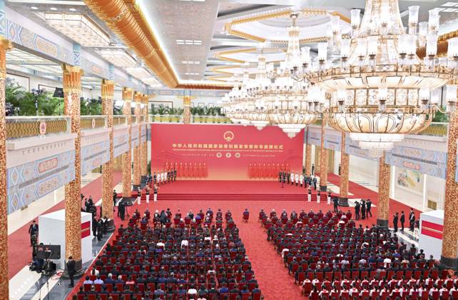 (240929) -- BEIJING, Sept. 29, 2024 -- This photo taken on Sept. 29, 2024 shows the venue of the presentation ceremony at the Great Hall of the People in Beijing, capital of China. China held a high-profile ceremony on Sunday morning to award the highest state honors ahead of the 75th founding anniversary of the People s Republic of China. ) (FOCUS)CHINA-BEIJING-HIGHEST STATE HONORS-CEREMONY (CN) YuexYuewei 