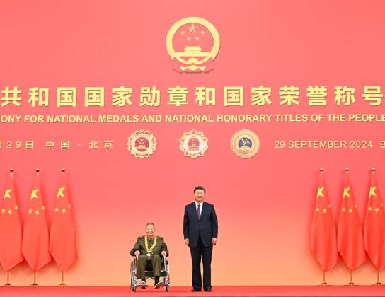 (240929) -- BEIJING, Sept. 29, 2024 -- Chinese President Xi Jinping, also general secretary of the Communist Party of China (CPC) Central Committee and chairman of the Central Military Commission, presents the Medal of the Republic to Huang Zongde in Beijing, capital of China, Sept. 29, 2024. A presentation ceremony for national medals and national honorary titles of the People s Republic of China was held at the Great Hall of the People in Beijing on Sunday. ) CHINA-BEIJING-NATIONAL MEDALS AND HONORARY TITLES-PRESENTATION CEREMONY (CN) XiexHuanchi 