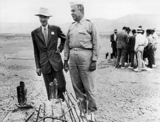 Original caption... All that s left of atomic base tower. Los Alamos, New Mexico...Dr.J.Oppenheimer, of the university of California and director of the Las Alamos atomic bomb test project, and major general Leslie E. Groves, chief of Manhattan engineering district, stand alongside the remains of the tower from which the atomic test was set off 40 miles west of Carrimozo, New Mexico. Orig. caption... THEY DIRECTED ATOMIC TEST BLAST IN NEW MEXICO. Carrizozo, New Mexico. Here are Dr. J. R. Oppenheimer left, of the university of California, and major gen. Leslie E. Groves, Chief of the Manhattan engineering district looking at the base of the tower on which the atomic bomb was suspended during the test explosion in the obscure mountain range f Copyright: xXxXxXx ATOMIC BOMB TEST IN NEW MEXICO