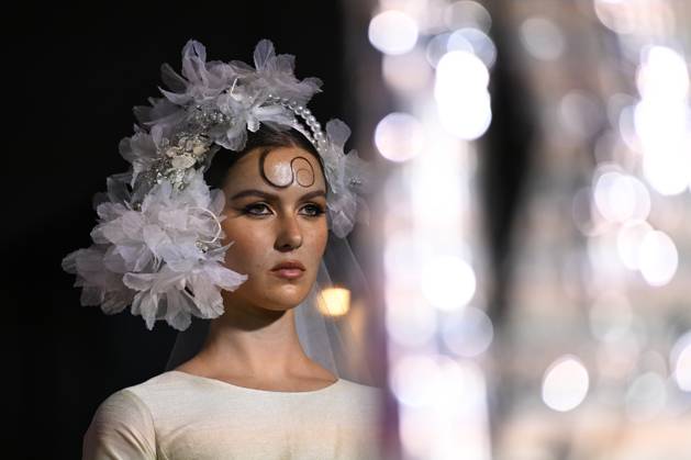 MELBOURNE FASHION WEEK PREVIEW, A model walks the runway wearing a design by Wa Ring during a Melbourne Fashion Week media preview in Melbourne, Monday, October 21, 2024. ( NO ARCHIVING, EDITORIAL USE ONLY, NO USE IN BOOKS WITHOUT CONSENT Melbourne Victoria Australia Copyright: xJAMESxROSSx 20241021157746448760