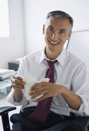Portrait of smiling businessman holding Chinese take away , 10.01.2010, model released, TTBB_ti0232554.jpg, Portrait,Businessman,Mature Man,Chinese Takeout,Vertical,Indoors,40-44 Years,Chinese Ethnicity,Front View,Short Hair,Holding,Shirt And Tie,One Person,Take Out Food,Day,Sitting,Business,Cheerful,Enjoyment,Happiness,Grey Hair,Office Worker,Food And Drink,Unhealthy Eating,Office,Chinese Food,Looking At Camera,Toothy Smile,Waist Up,Male,One Person Only,Daytime,Cheerfulness,Happy,Enjoy,Enjoying,Gray Hair,Junk Food Copyright: xJamiexGrillxAtlasx
