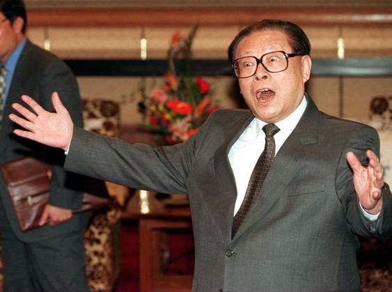 Jiang Zemin uses his facial expression to praise Tung Chee-hwa s achievement while being questioned by the media in the meeting between Jiang and Tung in Beijing, where the National People s Congress (NPC) is currently being held in the Great Hall of the People.