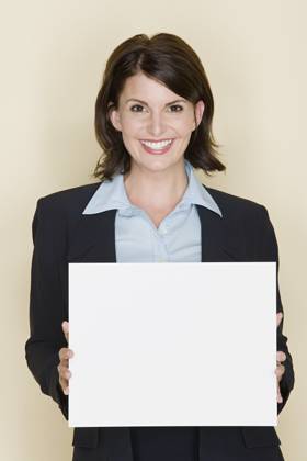 Portrait of smiling businesswoman holding blank page, studio shot , 01.03.2012, model released, TTBB_ti5801518.jpg, Portrait,Businesswoman,One Person,Blank,Smiling,Ideas,Confidence,Happiness,Brown Hair,One Mid Adult Woman Only,Looking At Camera,Copy Space,Medium Length Hair,Page,Formal Wear,Paper,Horizontal,Head And Shoulders,Studio Shot,30-34 Years,Colored Background Copyright: xFisherxLitwinx