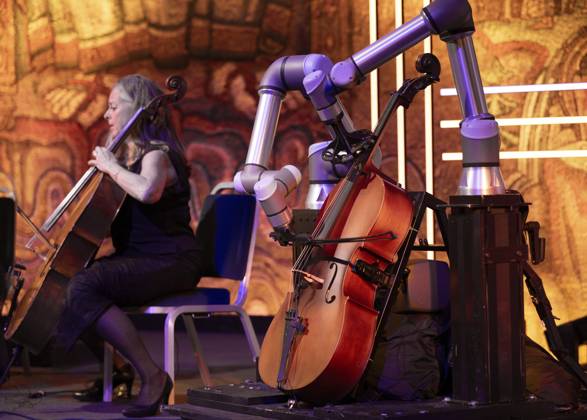 STOCKHOLM, SWEDEN 20241025 Stockholm Concert Orchestra and a cello playing robot, programmed by Fredrik Gran, perform a prelude written by Jacob Mürlrad during the Academy of Engineering Sciences IVA ceremony at the City Hall in Stockholm on Friday STOCKHOLM SWEDEN x10040x  Copyright: xAndersxWiklund TTx IVAS HÖGTIDSSAMMANKOMST 2024 zQPwYUh3YH4