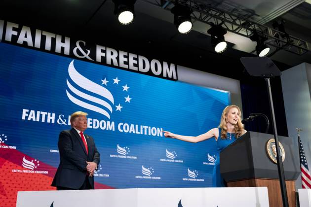 June 26, 2019, Washington, Dc, United States of America: U.S. President Donald Trump, left, listens to Natalie Harp, right, speak after inviting her on stage at a Faith and Freedom Coalition Road to Majority 2019 Conference at the Washington Marriott Wardman Park Hotel, June 26, 2019, in Washington, D.C. Washington United States of America - ZUMAp138 20190626_zaa_p138_005 Copyright: xJoycexN.xBoghosian WhitexHousex