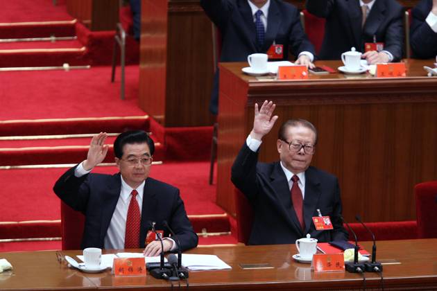 China s President Hu Jintao (L) and former president Jiang Zemin during the concluding session of the 17th Party Congress at the Great Hall of the People in Beijing. Beijing. 21 October 2007.