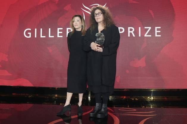 November 18, 2024, Toronto, On, CAN: Anne Michaels (right) stands with Elana Rabinovitch, the Executive Director of Giller Prize as she accepts the Giller Prize for her book Held at a ceremony in Toronto, Monday, Nov. 18, 2024. Toronto CAN  - ZUMAc35_ 20241118_zaf_c35_173 Copyright: xChrisxYoungx