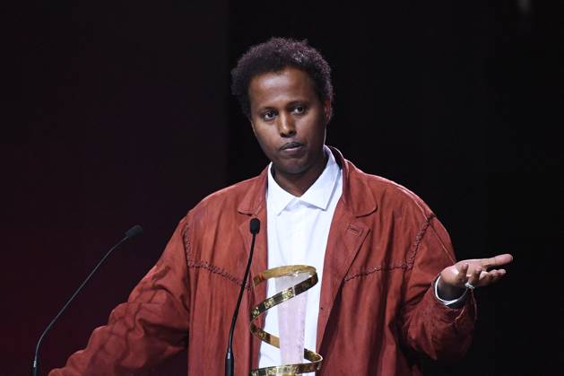 Marrakech Closing Ceremony Director Mo Harawe receives the award for The village next to Paradise attending the Closing Ceremony during the 21st Marrakech International Film Festival in Marrakech, Morocco on December 07, 2024. Photo by Aurore Marechal ABACAPRESS.COM Marrakech Morocco  Copyright: xMarechalxAurore ABACAx