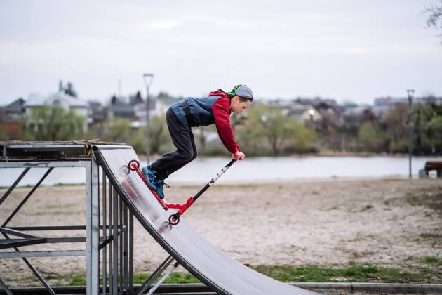 Boy on scooter makes a trick and enjoying his riding in the skate park at cloudy spring day, model released, , 40631236.jpg, boy, scooter, teenager, trick, young, extreme, jump, child, youth, city, culture, ride, park, outdoor, male, speed, lifestyle, sport, legs, teen, skate, active, activity, healthy, urban, fun, board, danger, kick, skating pool, people, person, guy, kick scooter, skating, street, skater, skateboard, skate park, skateboarding, high, jumping for joy, action, stock, paris, motion, skateboarder, long board, image, airborne RECORD DATE NOT STATED
