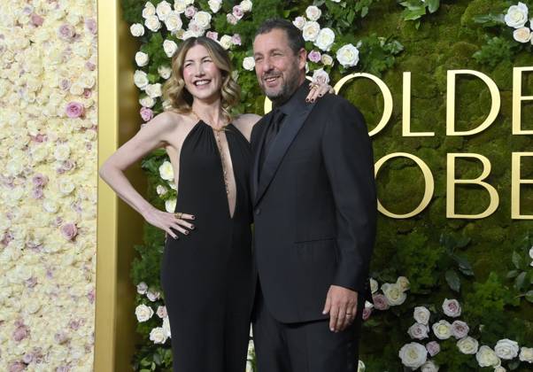 (L-R) Jackie Sandler and Adam Sandler arrive for the 82nd annual Golden Globe Awards ceremony for excellence in film and American television productions of 2024 at the Beverly Hilton Hotel in Beverly Hills, California on Sunday, January 5, 2025.  LAP20250105277 JIMxRUYMEN