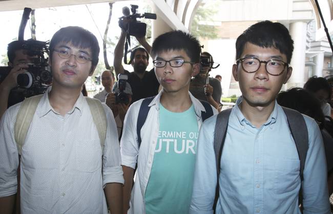 (L-R) Alex Chow Yong-kang, Joshua Wong Chi-fung and Nathan Law Kwun-chung arrive at Eastern Court to receive verdict for storming into citizen square. 21JUL16 SCMP Sam Tsang Hong Kong China EDITORIAL USE ONLY  Copyright: xx MER1607211527460250 SamxTsangx scmpphotos901911