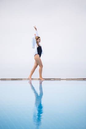 An attractive young woman in a black swimsuit and white shirt stands near the pool with a panoramic view., model released, , 49143094.jpg, woman, beach, fashion, spa, water, person, girl, sport, fitness, erotic, vintage, summer, nature, face, sun, bikini, pool, swimming, view, swimsuit, female, young, people, swimwear, vacation, travel, luxury, relaxation, resort, leisure, one, indoors, sunbathing, rest, fashionable, sexy, recreation, villa, lifestyle, body, fun, hotel, slim, tropical, day, bali, pretty, style, outdoor, outdoors RECORD DATE NOT STATED