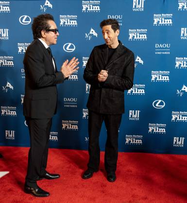 February 13, 2025, Santa Barbara, California, USA: Adrien Brody is greeted by Festival Executive Director Roger Durling as he arrives at the red carpet Thursday night to receive the Cinema Vanguard Award at the 40th annual Santa Barbara International Film Festival. Spotlighting their performances in Brady CorbetÃ¢â‚¬â ¢s THE BRUTALIST, BrodyÃ¢â‚¬â ¢s portrayal of Toth highlights an immigrantÃ¢â‚¬â ¢s struggle to overcome his war-torn past and rebuild his life in a Post-War America. Pearce, in contrast, delivers a chilling, domineering performance as a wealthy art patron whose vision of American modernity collides with TothÃ¢â‚¬â ¢s. The tension between the two not only drives the narrative but also symbolizes the larger struggle between inn - ZUMAa35_ 20250213_zaf_a35_020 Copyright: xDanielxA.xAndersonx