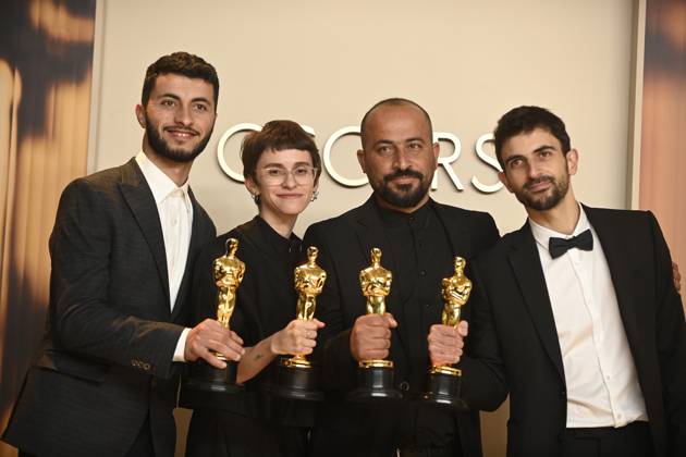 HOLLYWOOD, CA - MARCH 2: Basel Adra, Rachel Szor, Hamdan Ballal and Yuval Abraham in the press room at the 97th Academy Awards on March 2, 2025 at the Dolby Theatre in Hollywood, California. Copyright: xMediaPunchx