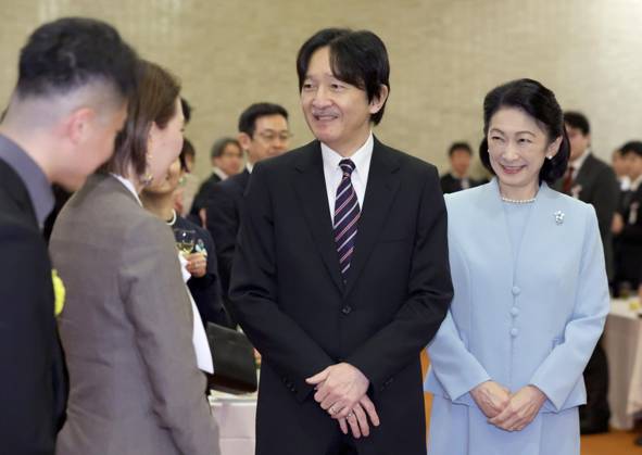 Japan crown prince at award ceremony Japanese Crown Prince Fumihito (2nd from R) and Crown Princess Kiko (far R) chat with awardees after attending an award ceremony for promising researchers in their 20s to 30s in Tokyo on March 6, 2025. (Pool photo)  A14AA0004256082P
