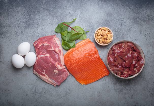 Food ingredients high in iron for health and wellness top view on grey concrete background Food ingredients high in iron for health and wellness top view on grey concrete background Copyright: xZoonar.com OlenaxYeromenkox 23006735