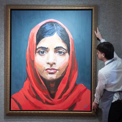 Bonhams 20th 21st Century Art Day Evening Sales Highlights Photocall - Bonhams, London An art handler holds Malala Yousafzai by Zara Muse (est £8k - £12k) which is to go on auction at Bonhams 20th 21st Century Art Day Evening Sales at Bonhams in London, England, UK on Monday 31 March, 2025., Credit:Justin Ng Avalon UK, England, London, Bonhams Copyright: xJustinxNgx xAvalonx 0981806270