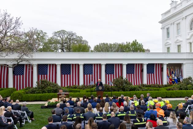 (250402) -- WASHINGTON, April 2, 2025 -- U.S. President Donald Trump (Rear) delivers remarks on reciprocal tariffs at the Rose Garden of the White House in Washington, D.C., the United States, on April 2, 2025. Amid widespread opposition, U.S. President Donald Trump on Wednesday signed an executive order on the so-called reciprocal tariffs, imposing a 10-percent minimum baseline tariff and higher rates on certain trading partners. ) U.S.-WASHINGTON, D.C.-TRUMP- RECIPROCAL TARIFFS -EXECUTIVE ORDER-SIGNING HuxYousong