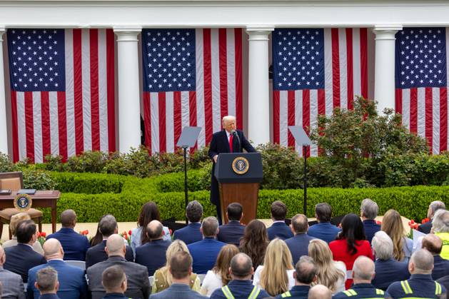 (250402) -- WASHINGTON, April 2, 2025 -- U.S. President Donald Trump (Rear) delivers remarks on reciprocal tariffs at the Rose Garden of the White House in Washington, D.C., the United States, on April 2, 2025. Amid widespread opposition, U.S. President Donald Trump on Wednesday signed an executive order on the so-called reciprocal tariffs, imposing a 10-percent minimum baseline tariff and higher rates on certain trading partners. ) U.S.-WASHINGTON, D.C.-TRUMP- RECIPROCAL TARIFFS -EXECUTIVE ORDER-SIGNING HuxYousong