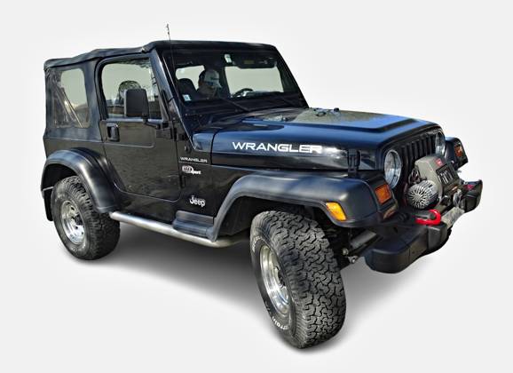 Schwarzer Jeep Wrangler tj 4x4 zeigt seine Off-Road-Fähigkeiten Black Jeep Wrangler tj 4x4 is parked and showing its off-road capabilities (License=RM) Copyright: xZoonar.com GamrothxJoergx 23288579