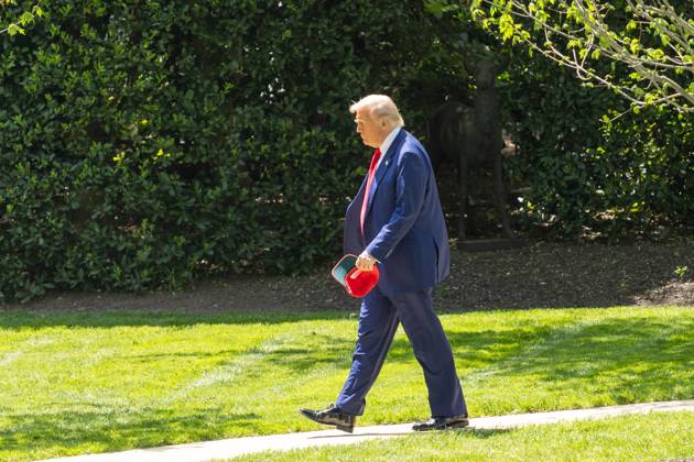 (250429) -- WASHINGTON, April 29, 2025 -- U.S. President Donald Trump walks toward the South Lawn to board Marine One at the White House in Washington, D.C., the United States, on April 29, 2025. The Trump administration has discharged a group of scientists and researchers working on the federal government s evaluation of the impact of climate change, citing the need to re-evaluate its approach to the project, reported The Wall Street Journal on Tuesday. ) U.S.-WASHINGTON, D.C.-WHITE HOUSE-TRUMP HuxYousong