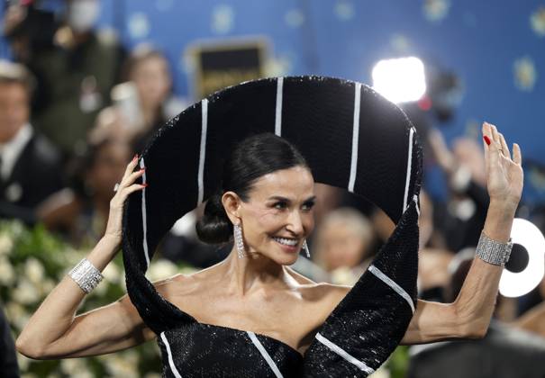 Demi Moore arrives on the red carpet at the 2025 Met Gala celebrating the opening of Superfine: Tailoring Black Style at The Metropolitan Museum of Art on Monday, May 5, 2025 in New York City.  NYP20250505118 JOHNxANGELILLO