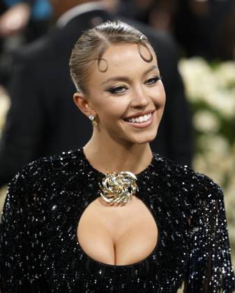 Sydney Sweeney arrives on the red carpet at the 2025 Met Gala celebrating the opening of Superfine: Tailoring Black Style at The Metropolitan Museum of Art on Monday, May 5, 2025 in New York City.  NYP20250505120 JOHNxANGELILLO