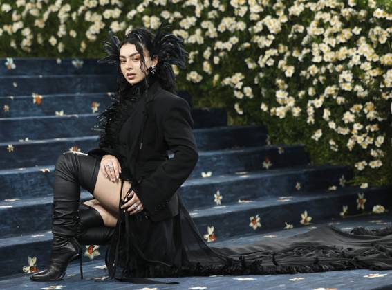 Charli XCX arrives on the red carpet at the 2025 Met Gala celebrating the opening of Superfine: Tailoring Black Style at The Metropolitan Museum of Art on Monday, May 5, 2025 in New York City.  NYP20250505138 JOHNxANGELILLO