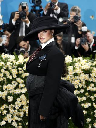 Rihanna arrives on the red carpet at the 2025 Met Gala celebrating the opening of Superfine: Tailoring Black Style at The Metropolitan Museum of Art on Monday, May 5, 2025 in New York City.  NYP20250505160 JOHNxANGELILLO