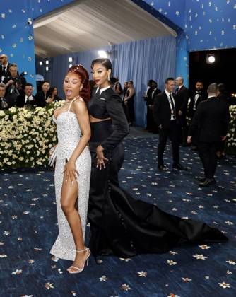 Megan Thee Stallion and Angel Reese arrive on the red carpet at the 2025 Met Gala celebrating the opening of Superfine: Tailoring Black Style at The Metropolitan Museum of Art on Monday, May 5, 2025 in New York City.  NYP20250505174 JOHNxANGELILLO