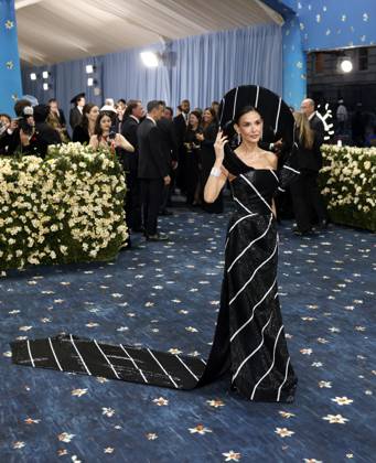 Demi Moore arrives on the red carpet at the 2025 Met Gala celebrating the opening of Superfine: Tailoring Black Style at The Metropolitan Museum of Art on Monday, May 5, 2025 in New York City.  NYP20250505182 JOHNxANGELILLO