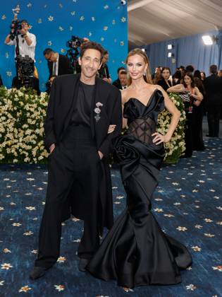 Adrien Brody and Georgina Chapman arrive on the red carpet at the 2025 Met Gala celebrating the opening of Superfine: Tailoring Black Style at The Metropolitan Museum of Art on Monday, May 5, 2025 in New York City.  NYP20250505604 JOHNxANGELILLO