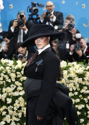 Rihanna arrives on the red carpet at the 2025 Met Gala celebrating the opening of Superfine: Tailoring Black Style at The Metropolitan Museum of Art on Monday, May 5, 2025 in New York City.  NYP20250505906 JOHNxANGELILLO