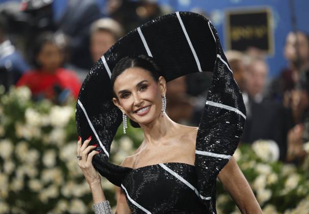 Demi Moore arrives on the red carpet at the 2025 Met Gala celebrating the opening of Superfine: Tailoring Black Style at The Metropolitan Museum of Art on Monday, May 5, 2025 in New York City.  NYP20250505918 JOHNxANGELILLO