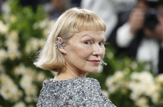 Pamela Anderson arrives on the red carpet at the 2025 Met Gala celebrating the opening of Superfine: Tailoring Black Style at The Metropolitan Museum of Art on Monday, May 5, 2025 in New York City.  NYP20250505927 JOHNxANGELILLO
