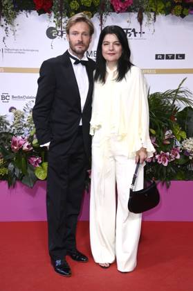Andreas Pietschmann und Jasmin Tabatabai bei der 75. Verleihung des Deutschen Filmpreises 2025 im Theater am Potsdamer Platz. Berlin, 09.05.2025