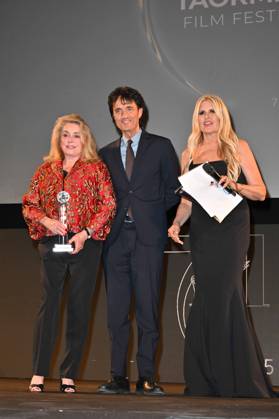 Taormina, 71st Taormina Film Festival 2025 - Day 2, Awards Ceremony. In the photo: Catherine Deneuve, Giulio Base  Copyright: xManuelexMangiarottix xipa-agency.netx xMangiarottix xD avanzox IPA_Agency_IPA58941930