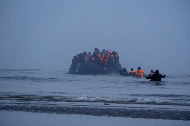 Bilder des Jahres 2025, News 06 Juni News Themen der Woche KW24 News Bilder des Tages Migrants at Dunkirk 14 06 2025 Migrants hoping to reach the Uk by small boat clash with police for the second day running on beaches close to Dunkirk..Police initially surrounded a large group headed for the waterline, and marched them back into the dunes - only for the group to return a few minutes later. Police fired repeated vollies of teargas, blanketing the beach, in an attempt to stop the running migrants, but n the end had to just stand and watch as the travellers boarded the rubber boat.  Copyright: xChrisxEadesx NINTCHDBPICT001002794952