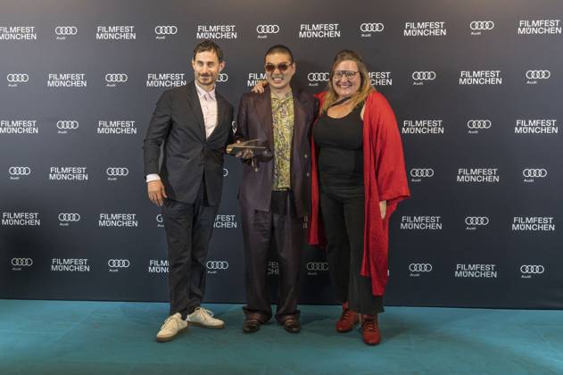 Clemens Schick , Soujiro Sanada und Anna Hints bei der Preisverleihung auf dem 42. Filmfest München 2025 im Amerikahaus. München, 05.07.2025