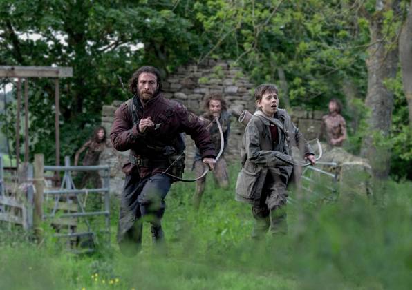 Aaron Taylor-Johnson and Alfie Williams UK. Aaron Taylor-Johnson and Alfie Williams in (C)Sony Pictures Releasing film: 28 Years Later (2025). Plot: Set 28 years after the initial Rage virus turned most people into aggressive zombies. LMK106-J11149-010725 Supplied by LMKMEDIA. Editorial Only. Landmark Media is not the copyright owner of these Film or TV stills but provides a service only for recognised Media outlets.