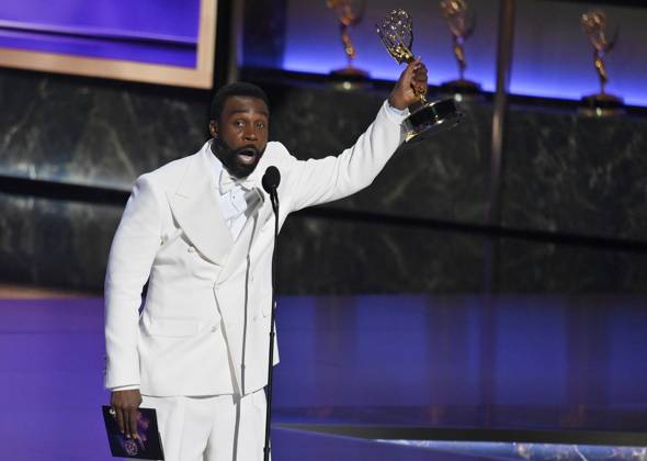 Tramell Tillman accepts the Outstanding Supporting Actor in a Drama Series award for Severance at the 77th annual Primetime Emmy Awards at the Peacock Theater in Los Angeles on Sunday, September 14, 2025.  LAP202509142031 JIMxRUYMEN