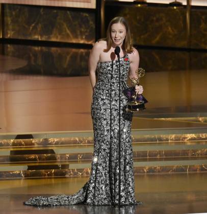 Hannah Einbinder accepts the Outstanding Supporting Actress in a Comedy Series award for Hacks onstage at the 77th annual Primetime Emmy Awards at the Peacock Theater in Los Angeles on Sunday, September 14, 2025.  LAP202509142063 JIMxRUYMEN