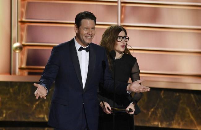 Ike Barinholtz and Kathryn Hahn speak at the 77th annual Primetime Emmy Awards at the Peacock Theater in Los Angeles on Sunday, September 14, 2025.  LAP2025091480462 JIMxRUYMEN