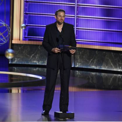 Charlie Hunnam speaks onstage at the 77th annual Primetime Emmy Awards at the Peacock Theater in Los Angeles on Sunday, September 14, 2025.  LAP202509143021 JIMxRUYMEN