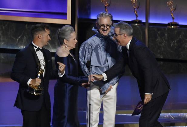 Daniel O Brien accepts the Outstanding Writing for a Variety Series award for Last Week Tonight with John Oliver onstage at the 77th annual Primetime Emmy Awards at the Peacock Theater in Los Angeles on Sunday, September 14, 2025.  LAP202509143035 JIMxRUYMEN
