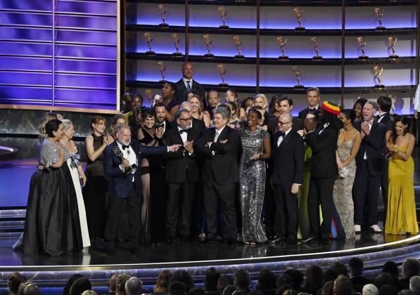 Cast and crew including Simran Baidwan, Katherine LaNasa, R. Scott Gemmill, Noah Wyle, John Wells, Tracy Ifeachor, Shawn Hatosy, Christopher Meloni, Patrick Ball, Supriya Ganesh and Taylor Dearden accept the Outstanding Drama Series award for The Pitt onstage at the 77th annual Primetime Emmy Awards at the Peacock Theater in Los Angeles on Sunday, September 14, 2025. LAP202509145002 JIMxRUYMEN