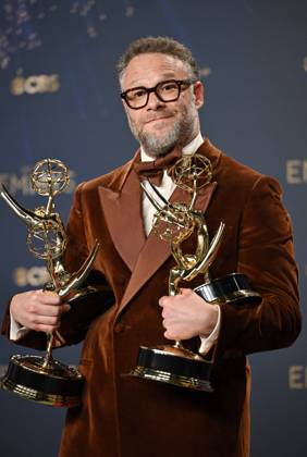 Seth Rogen holds the Emmys for Outstanding Writing for a Comedy Series, Outstanding Directing for a Comedy Series, Outstanding Lead Actor in a Comedy Series and Outstanding Comedy Series for The Studio, backstage during the 77th annual Primetime Emmy Awards at the Peacock Theater in Los Angeles on Sunday, September 14, 2025.  LAP20250914292 CHISxCHEW
